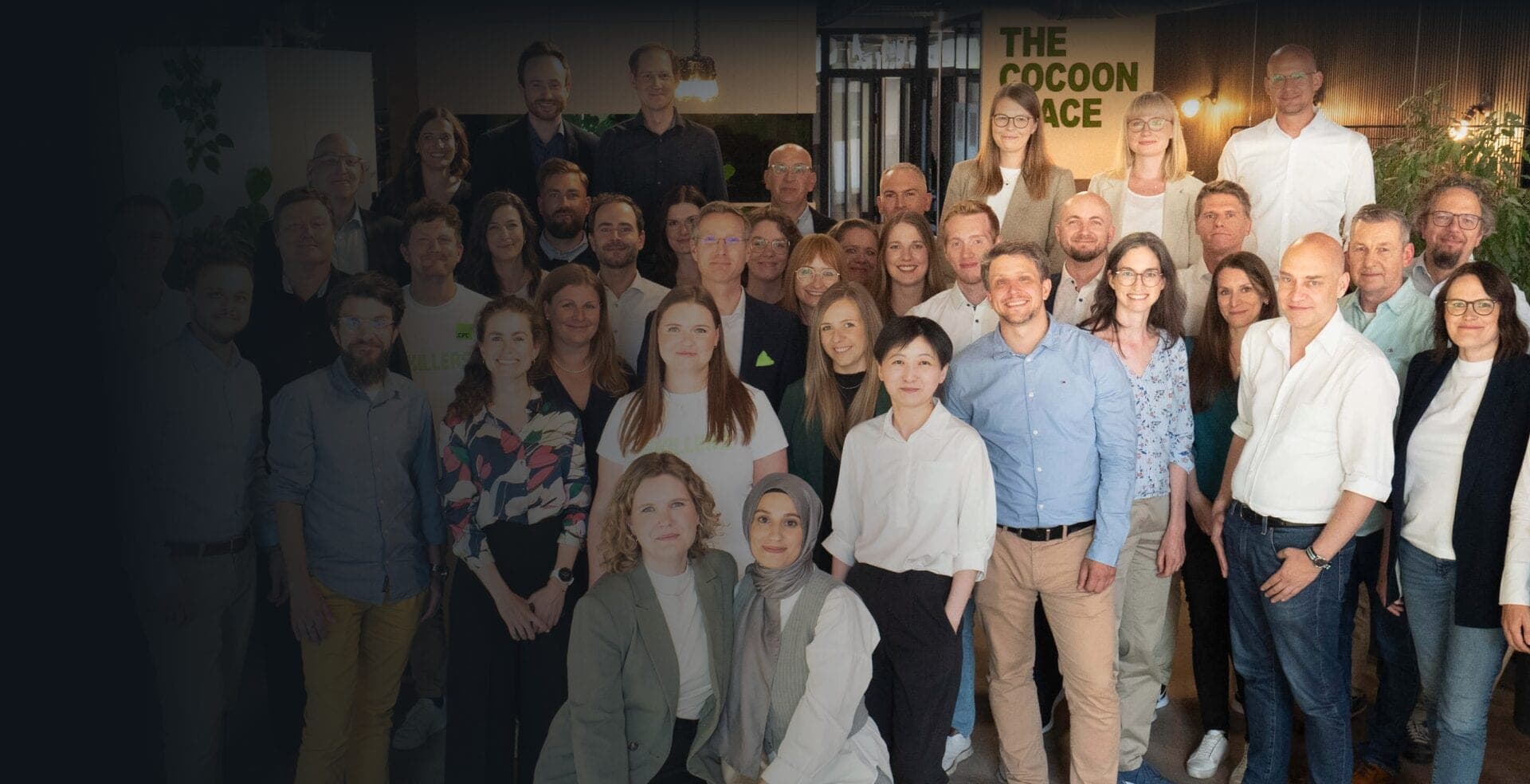 Gruppenfoto des CPC-Teams in einem begrünten Büroraum