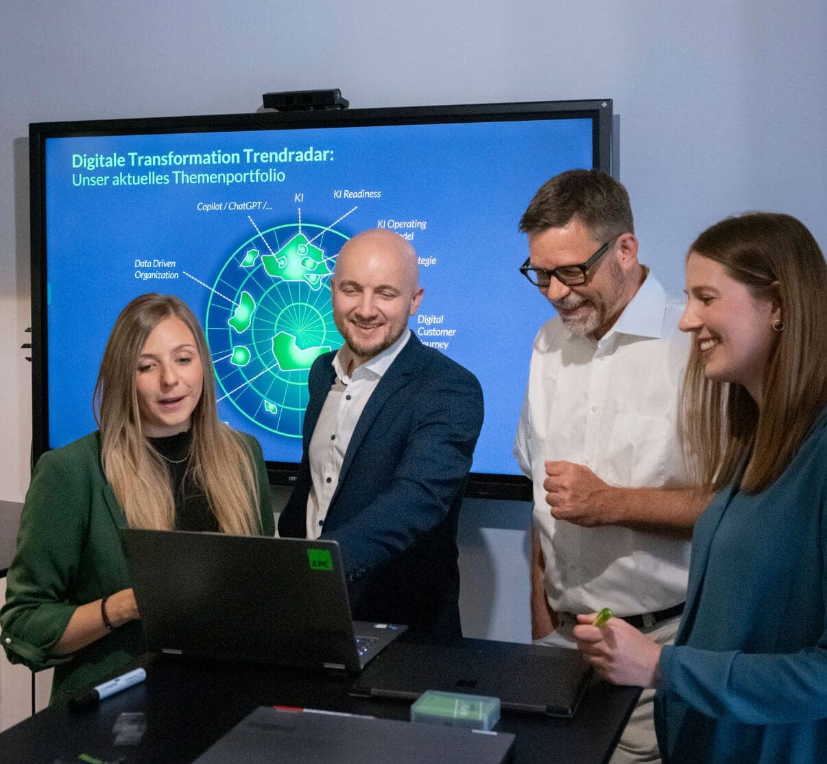 Team in front of a screen showing the Digital Transformation trend radar