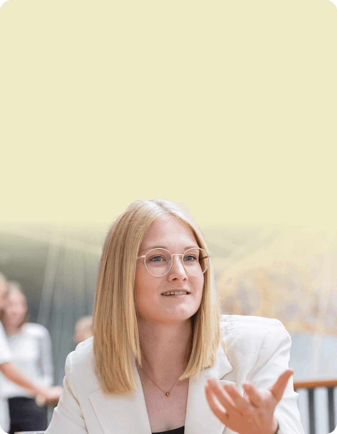 Consultant with glasses explaining something with an open hand