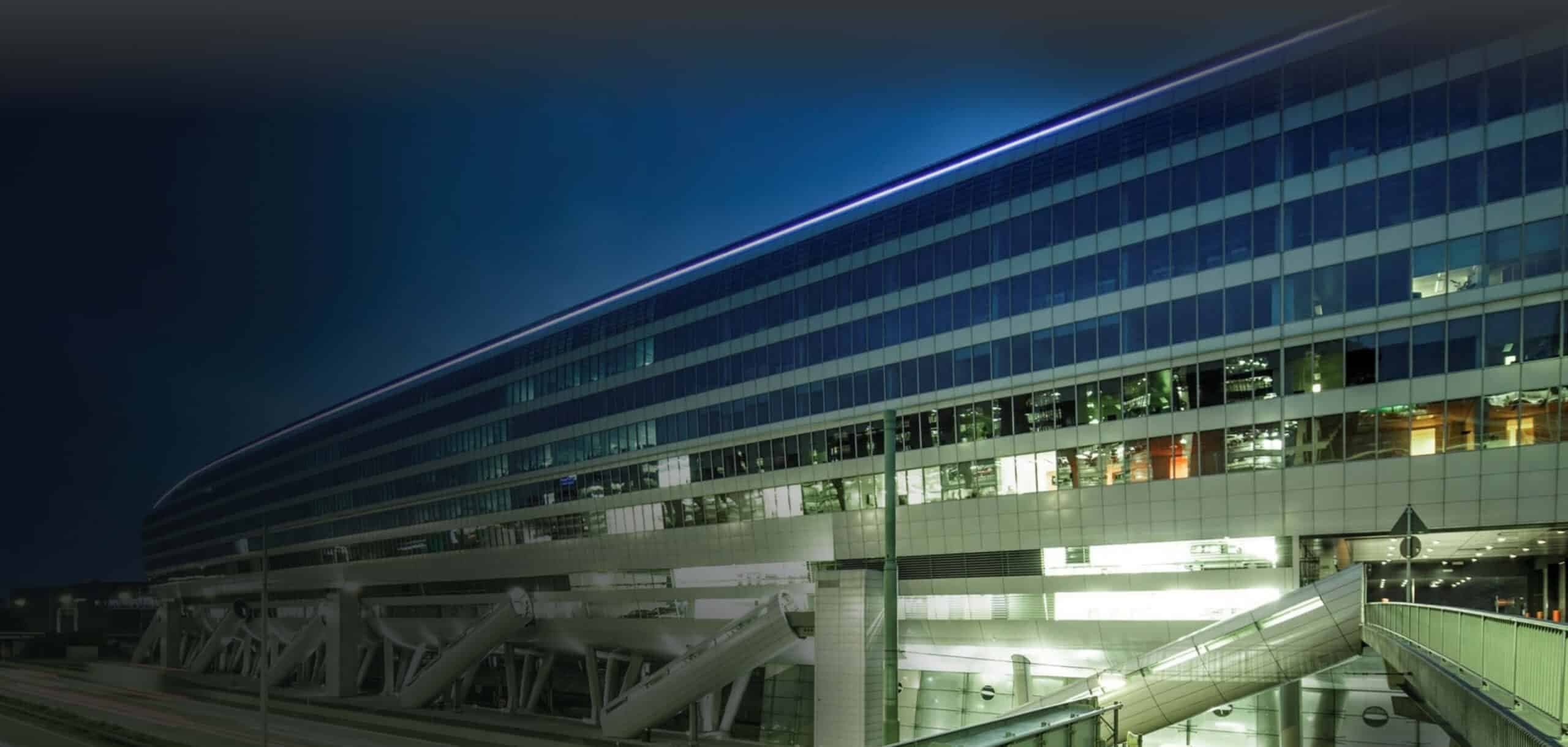 The Squaire office building at Frankfurt Airport at night, headquarters of CPC AG